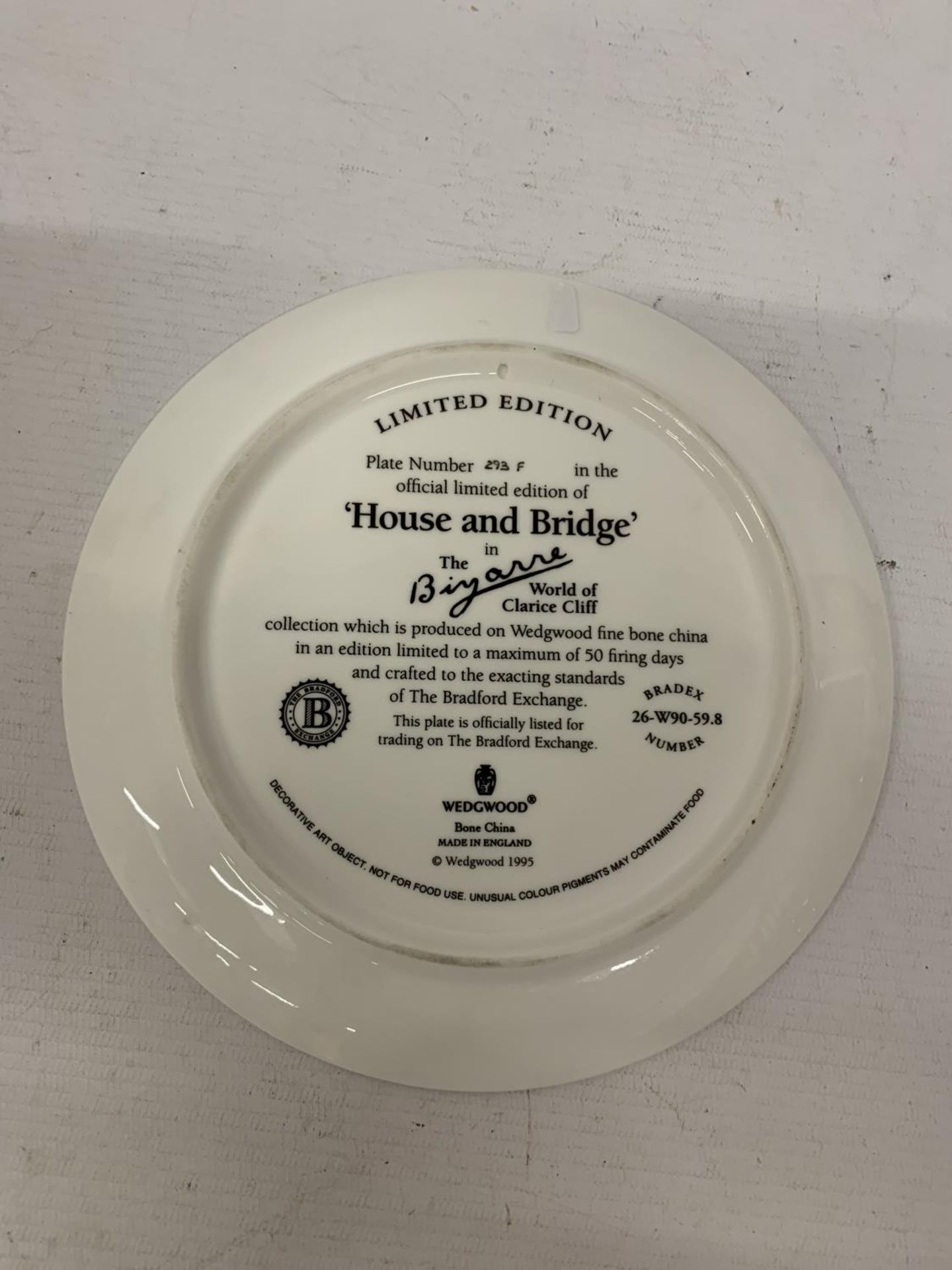 A WEDGEWOOD LIMITED EDITION CLARICE CLIFF 8" PLATE HOUSE AND BRIDGE - Image 2 of 2