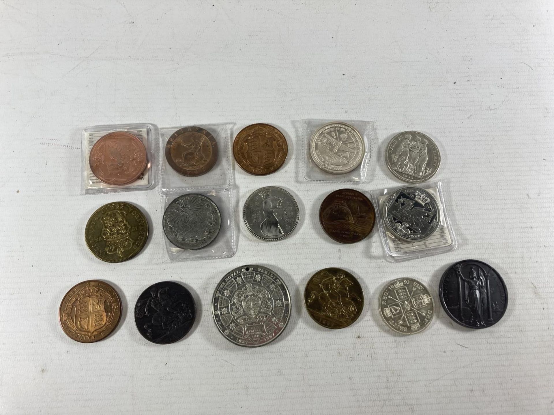 A GROUP OF 16 REPRODUCTION COINS