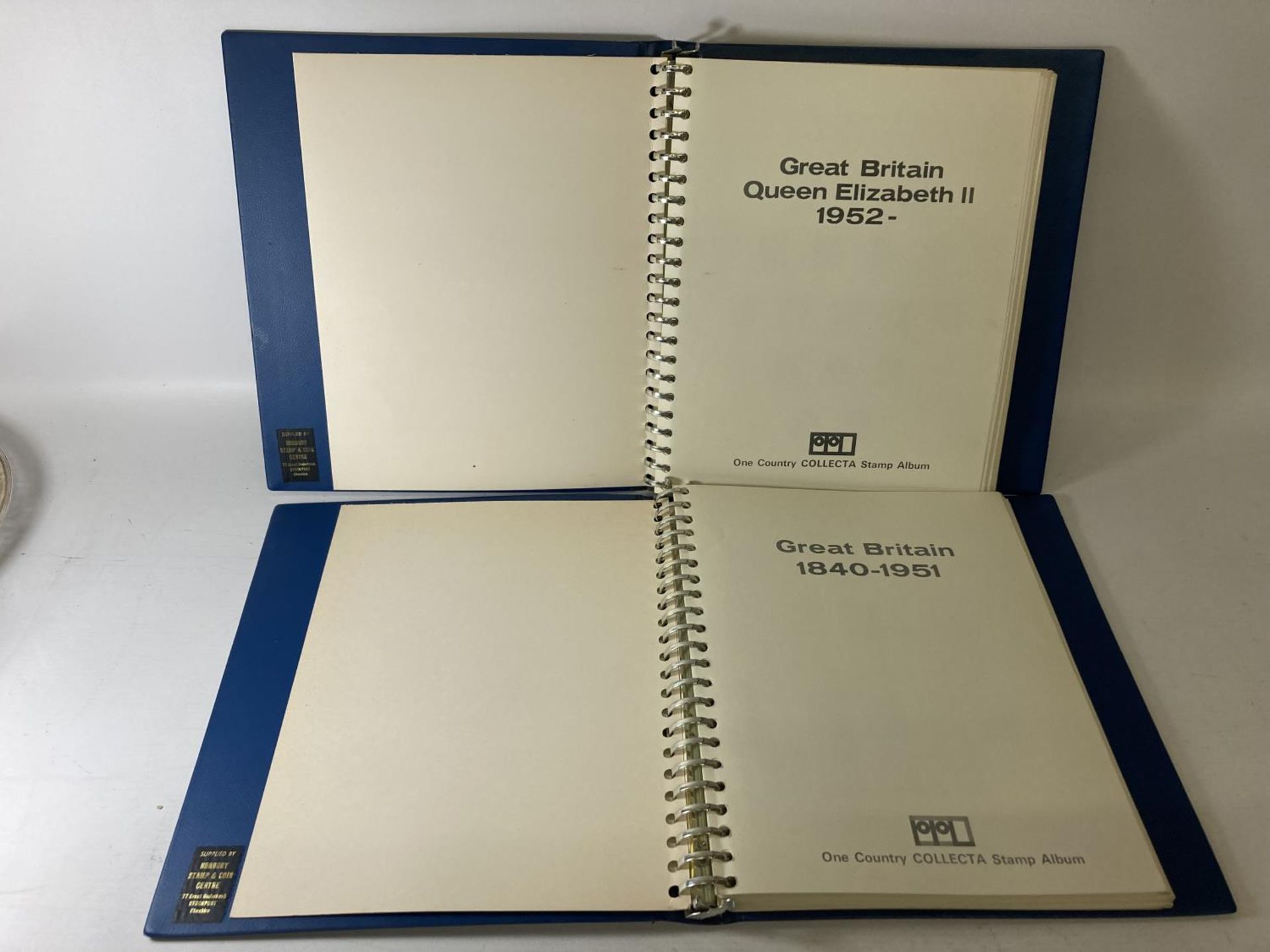 TWO BLUE STAMP ALBUMS CONTAINING STAMPS OF GREAT BRITAIN 1840 TO 1951 AND 1952 TO 1971