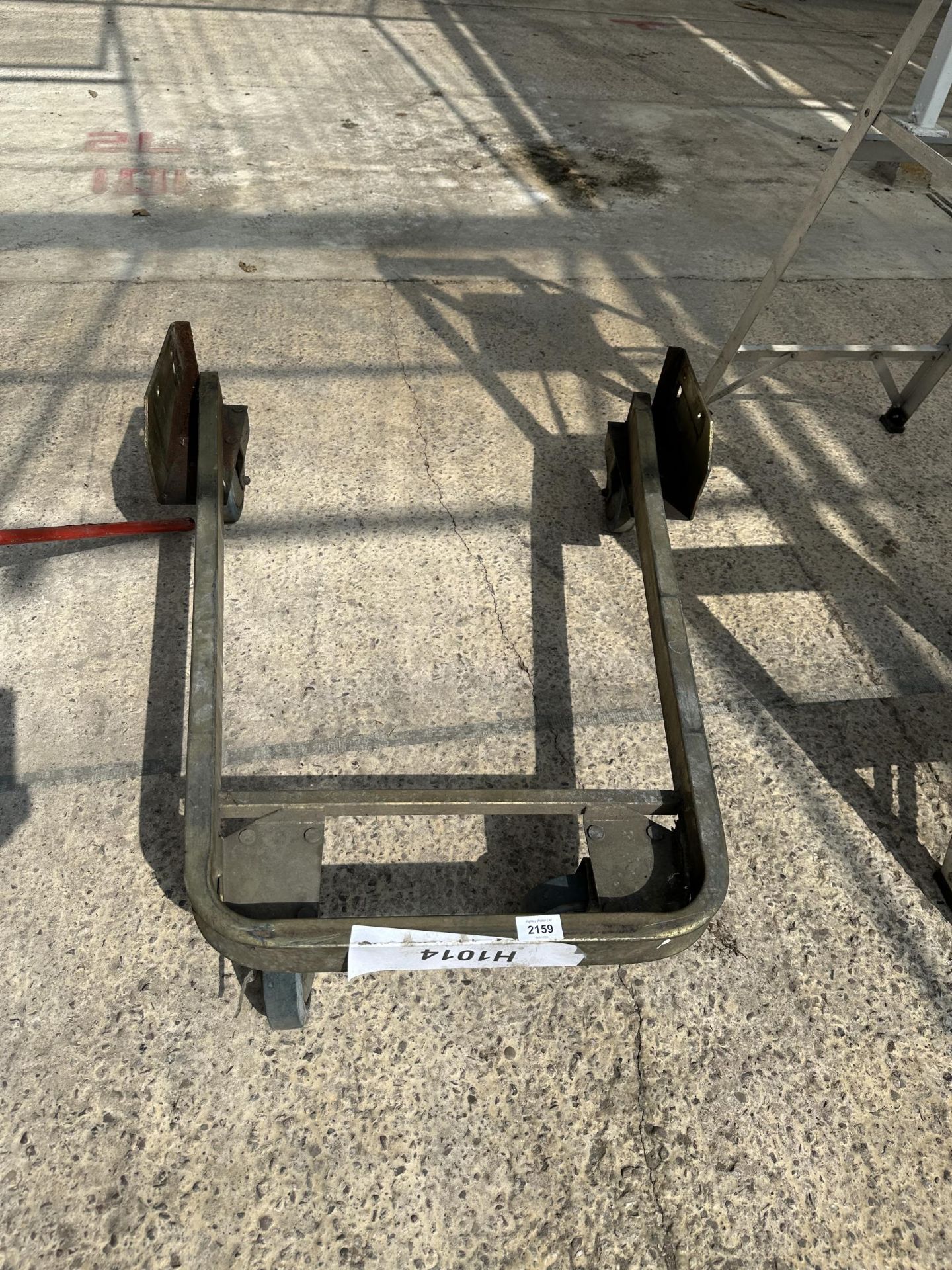 A METAL FOUR WHEELED TROLLEY BASE