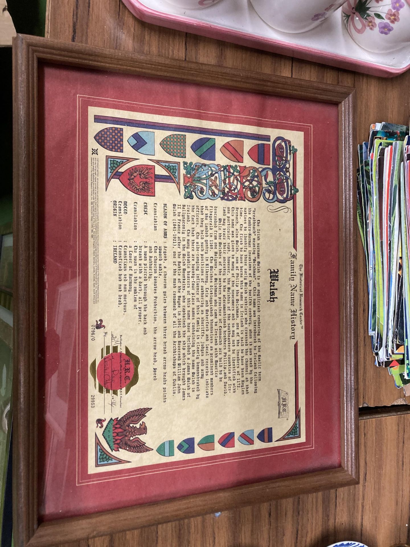 A FRAMED FAMILY NAME HISTORY 'WALSH' DATED 1994