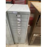 A MINIATURE 15 DRAWER FILING CABINET