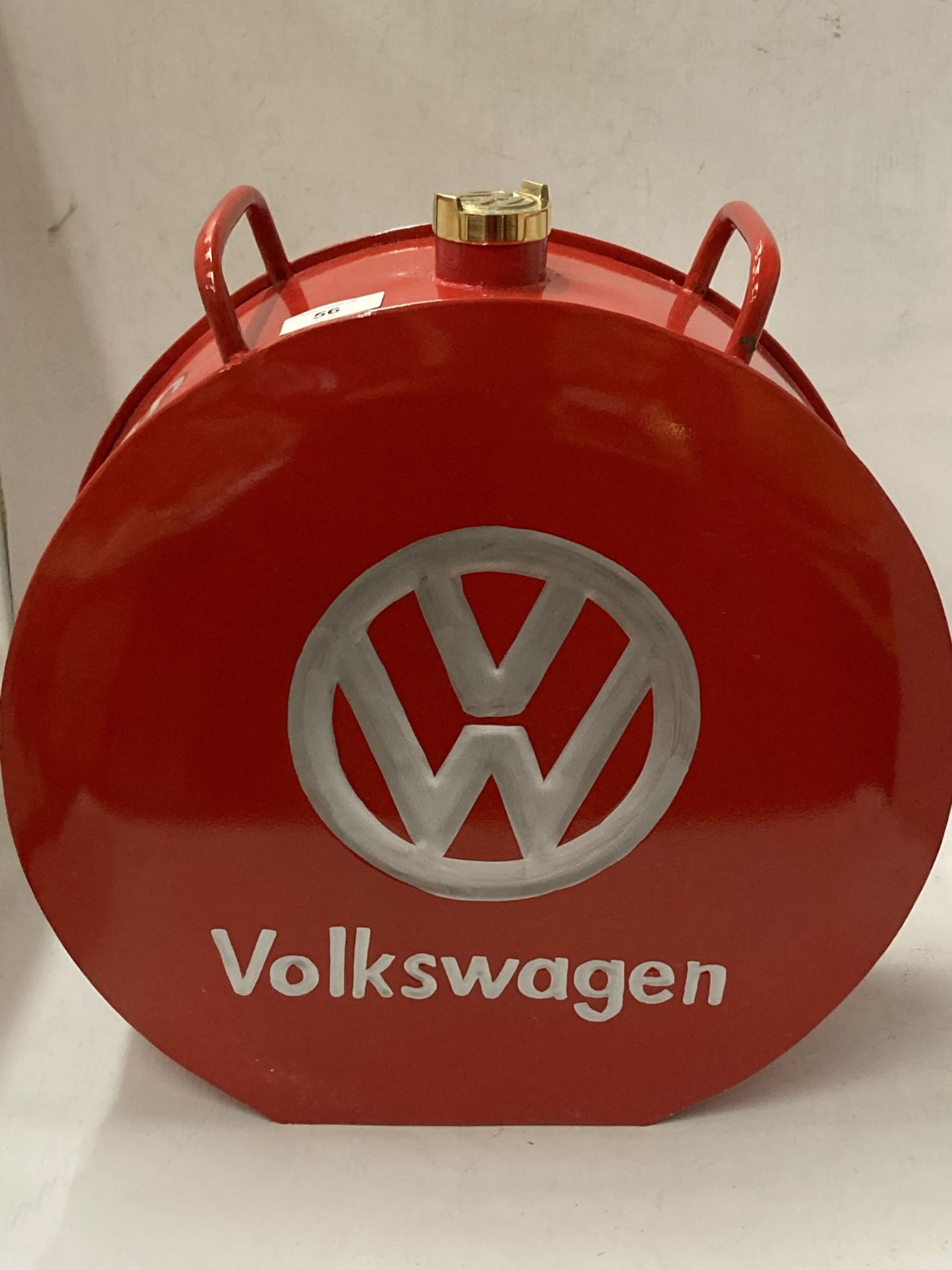 A RED VOLKSWAGEN PETROL CAN