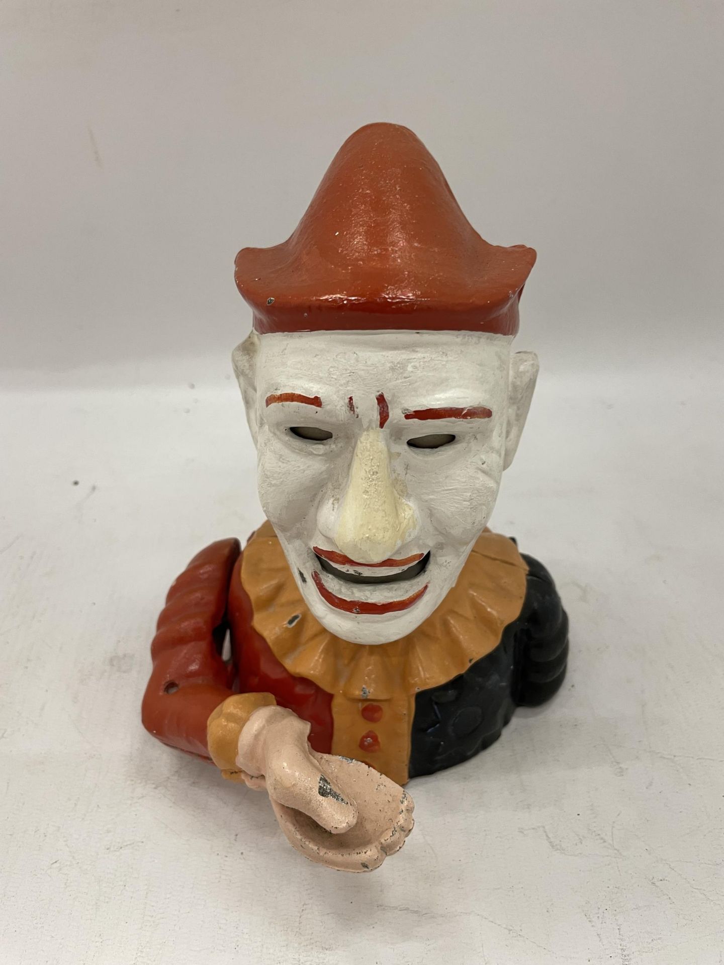 A CAST METAL JESTER MONEY BANK