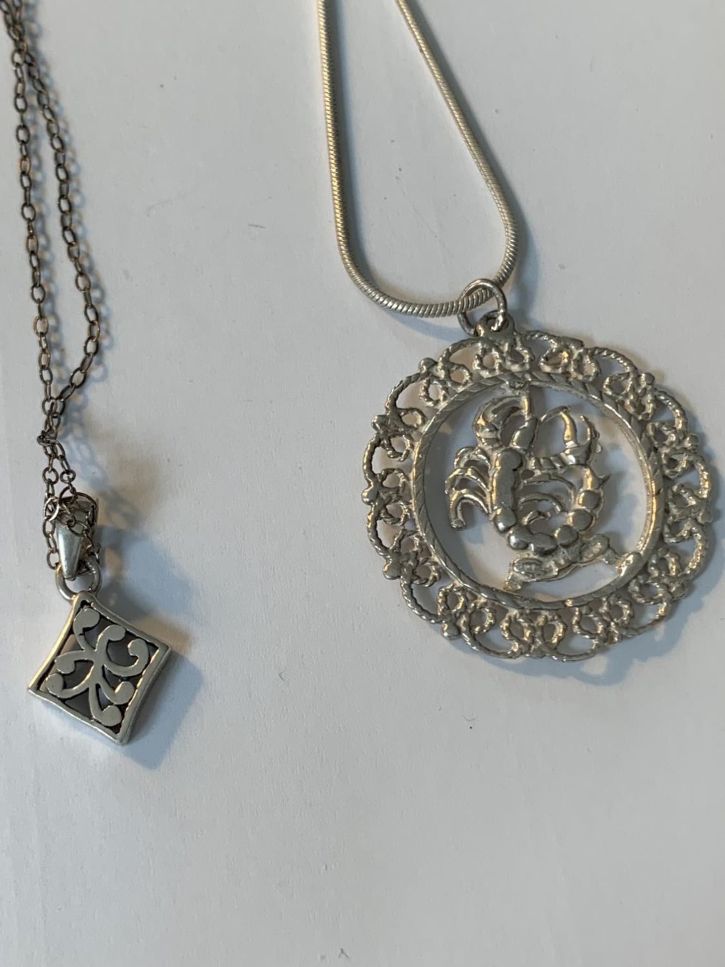 FOUR SILVER NECKLACES WITH PENDANTS - Image 3 of 3