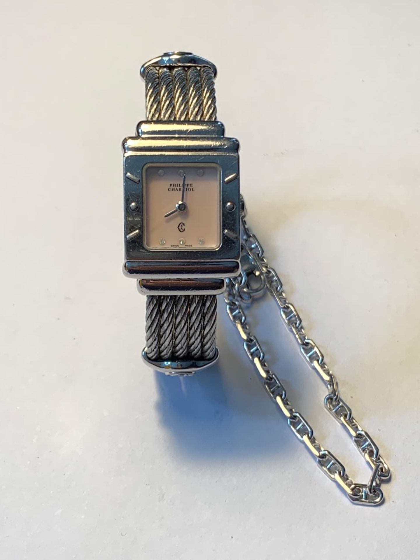 A PHILLIPE CHARRIOL SWISS MADE STERLING SILVER WRISTWATCH WITH ATTACHED BRACELET