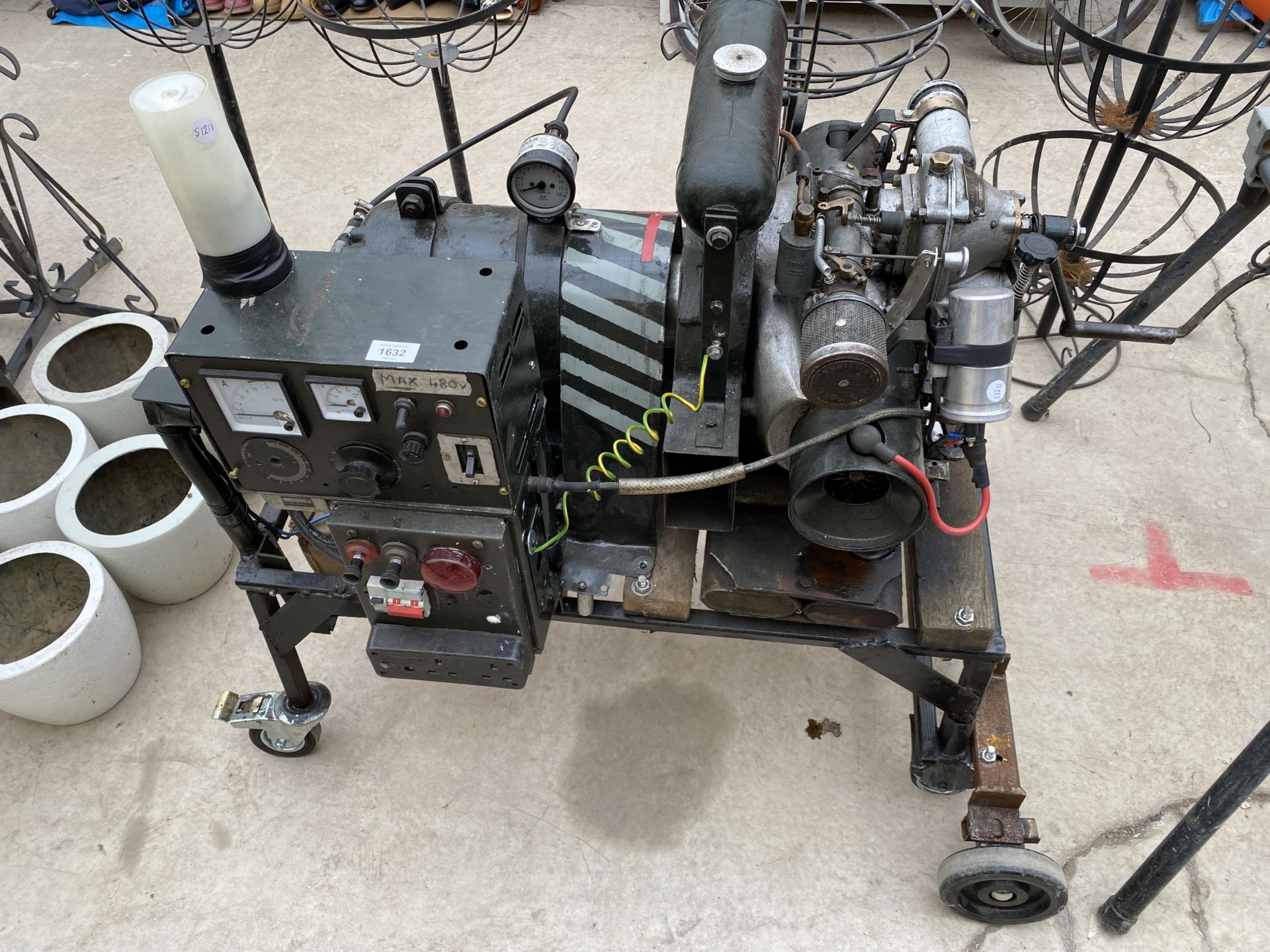 A CRANK HANDLE ENGINE PETROL GENERATOR