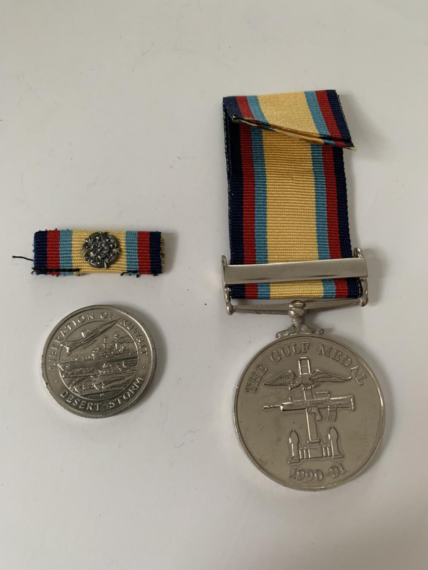 TWO MEDALS TO INCLUDE THE GULF MEDAL 1990-1991 AND A LIBERATION OF KUWAIT DESERT STORM MEDAL 1991
