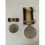 TWO MEDALS TO INCLUDE THE GULF MEDAL 1990-1991 AND A LIBERATION OF KUWAIT DESERT STORM MEDAL 1991