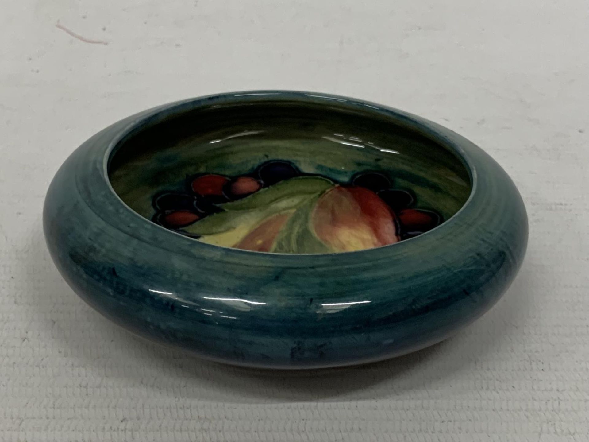 A MOORCROFT LEAF AND BERRY DISH - Image 2 of 3