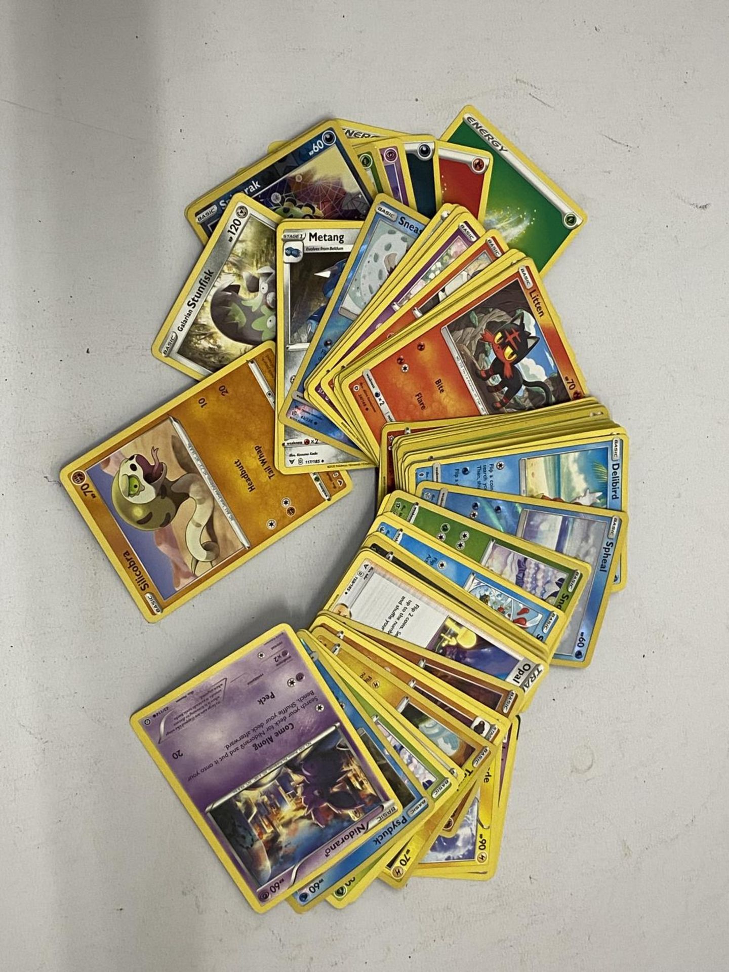A QUANTITY OF POKEMON CARDS - 76 IN TOTAL