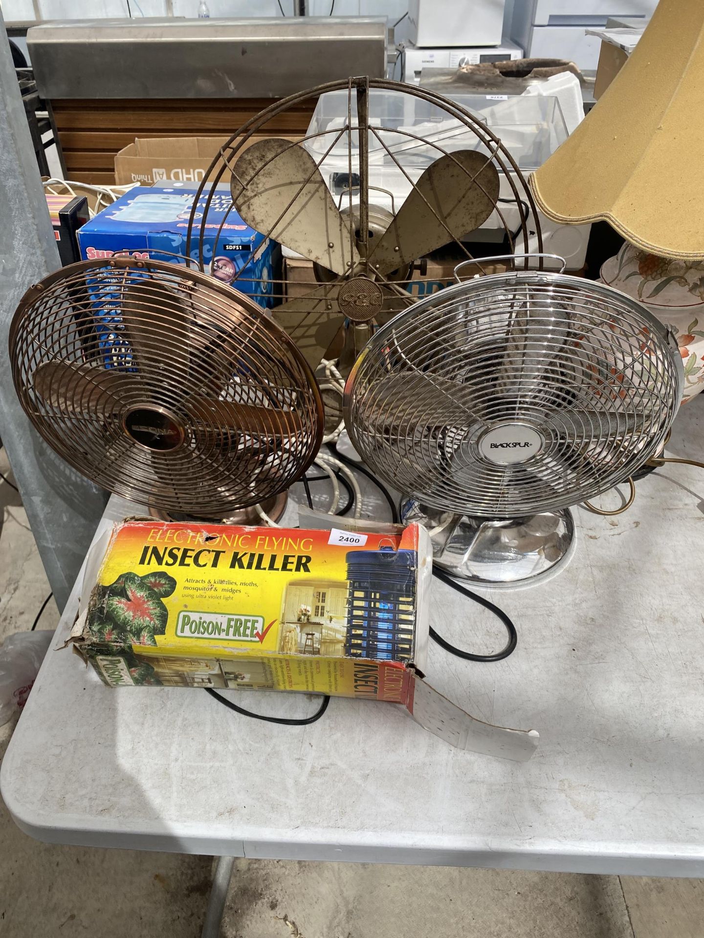 THREE DESK FANS AND AN INSECT KILLER