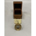 A 'CAPTAIN COOK' BRASS MAGNIFYING GLASS IN A WOODEN BOX