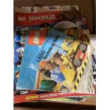 A GROUP OF LEGO BOOKLETS AND MAGAZINES