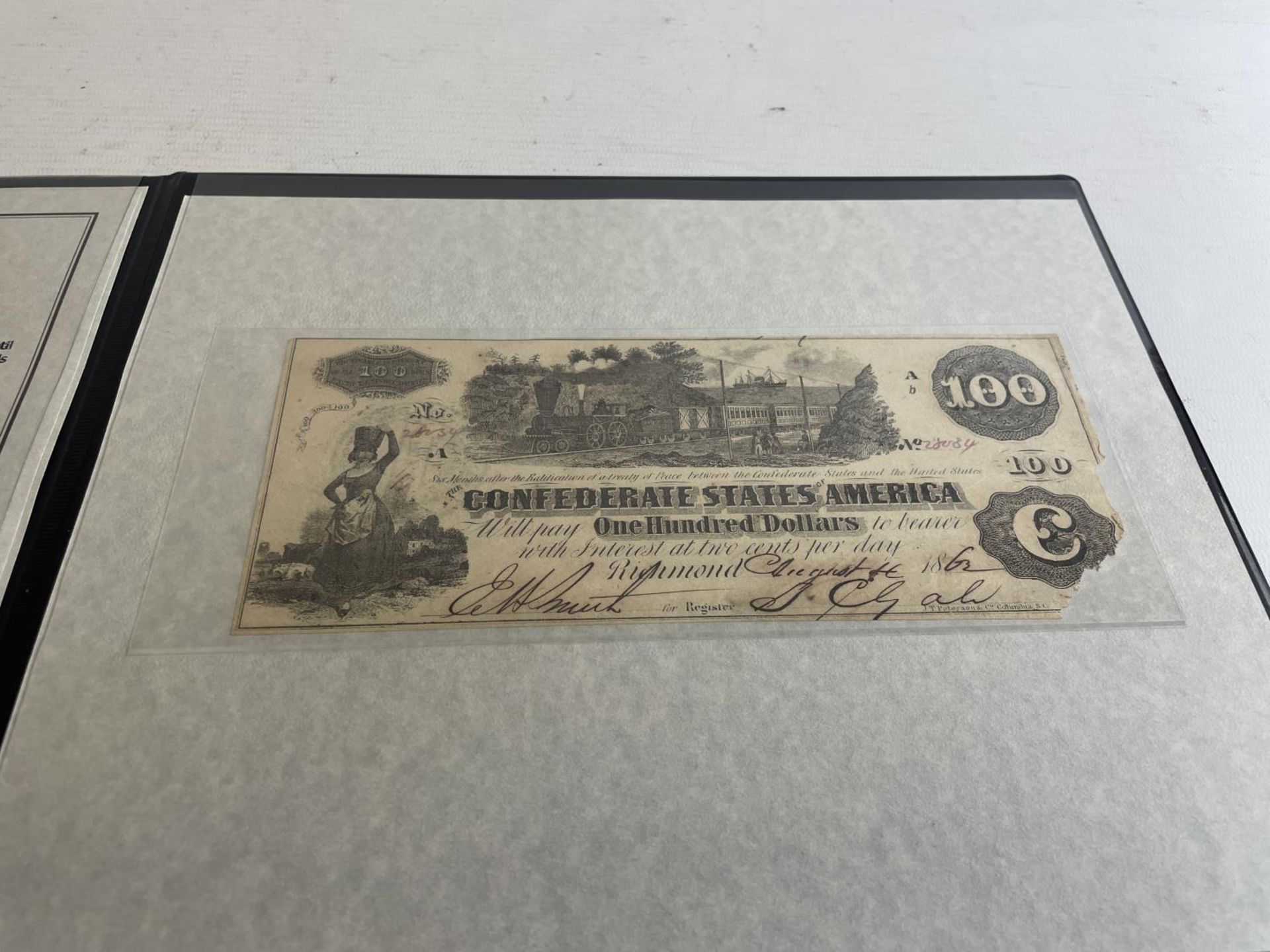 CONFEDERATE STATES OF AMERICA , $100 BANKNOTE , HOUSED IN WESTMINSTER FOLDER . - Image 2 of 3