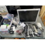 A LARGE ASSORTMENT OF ITEMS TO INCLUDE A MONITOR AND REMOTE CONTROLS ETC