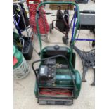 A QUALCAST CLASSIC PETROL 43S LAWN MOWER COMPLETE WITH GRASS BOX