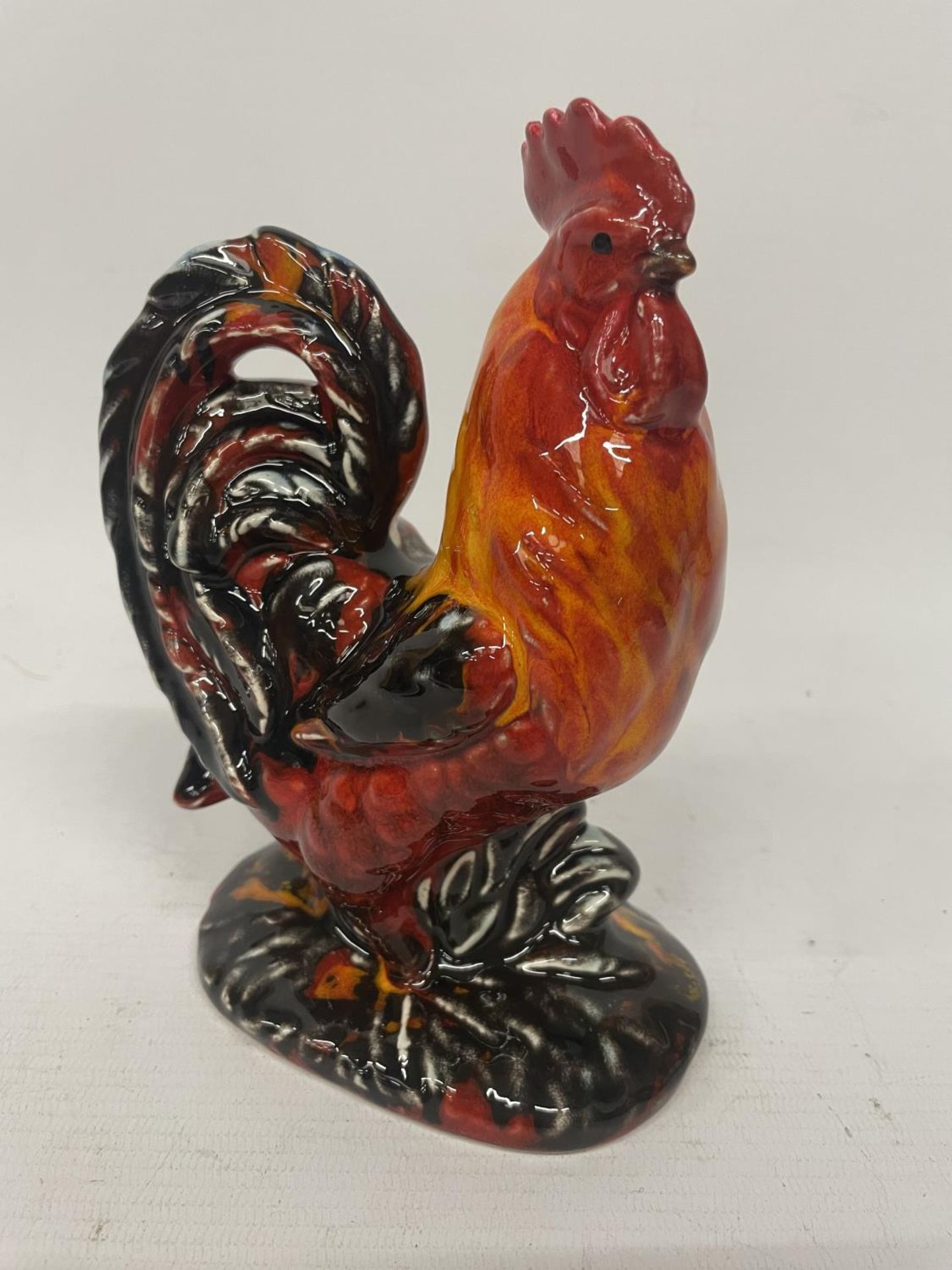 AN ANITA HARRIS COCKEREL FIGURE HAND PAINTED AND SIGNED IN GOLD