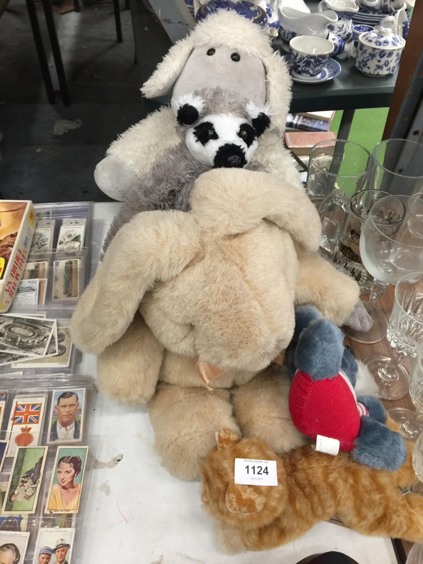 A QUANTITY OF CUDDLY TOYS TO INCLUDE A SHEEP, RABBIT, CAT, ETC.,