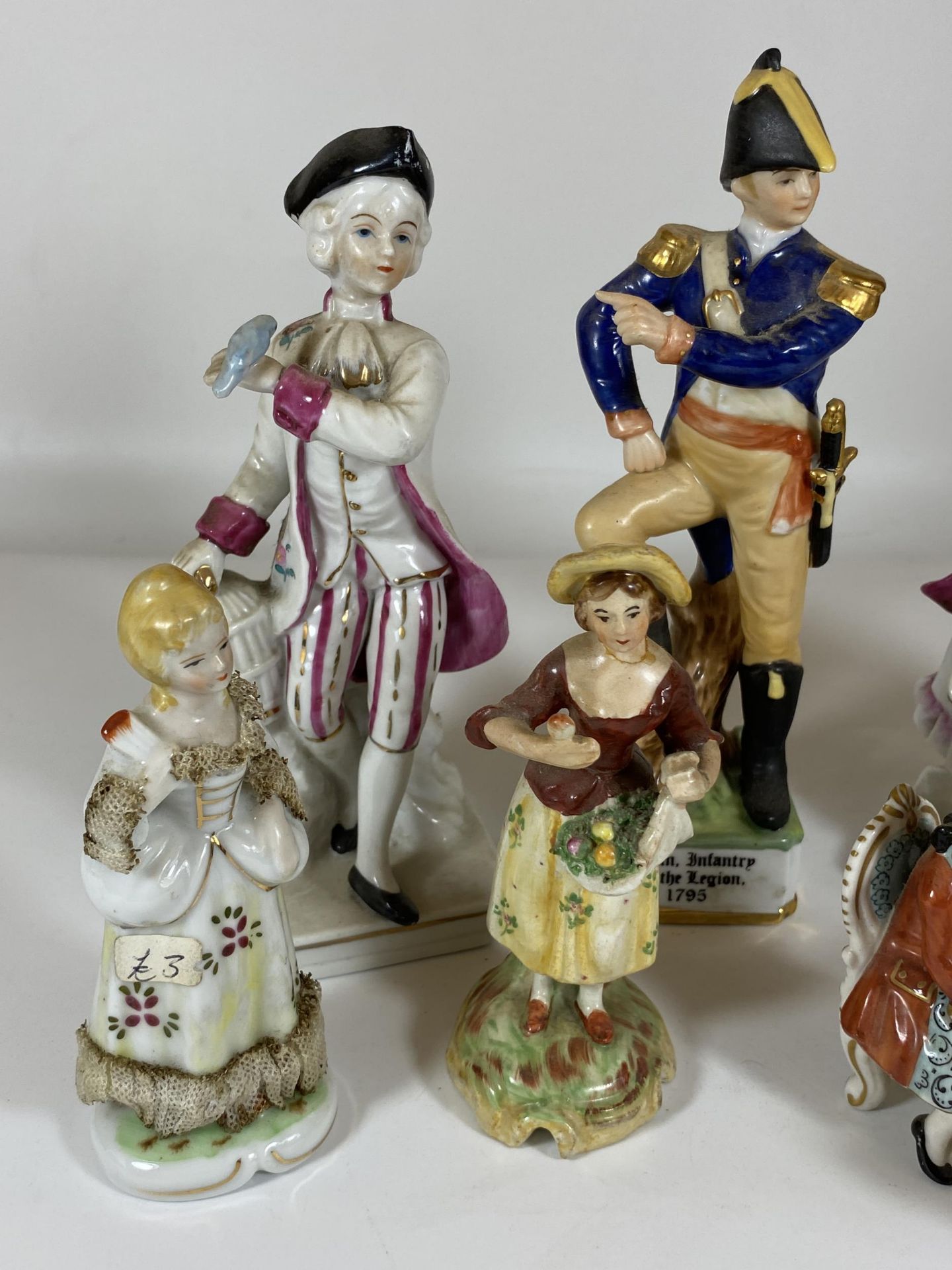 A COLLECTION OF CONTINENTAL FIGURES TO INCLUDE 'MZ' DRESDEN PIANO PLAYER, OFFICER SOLDIER FIGURE ETC - Image 2 of 5