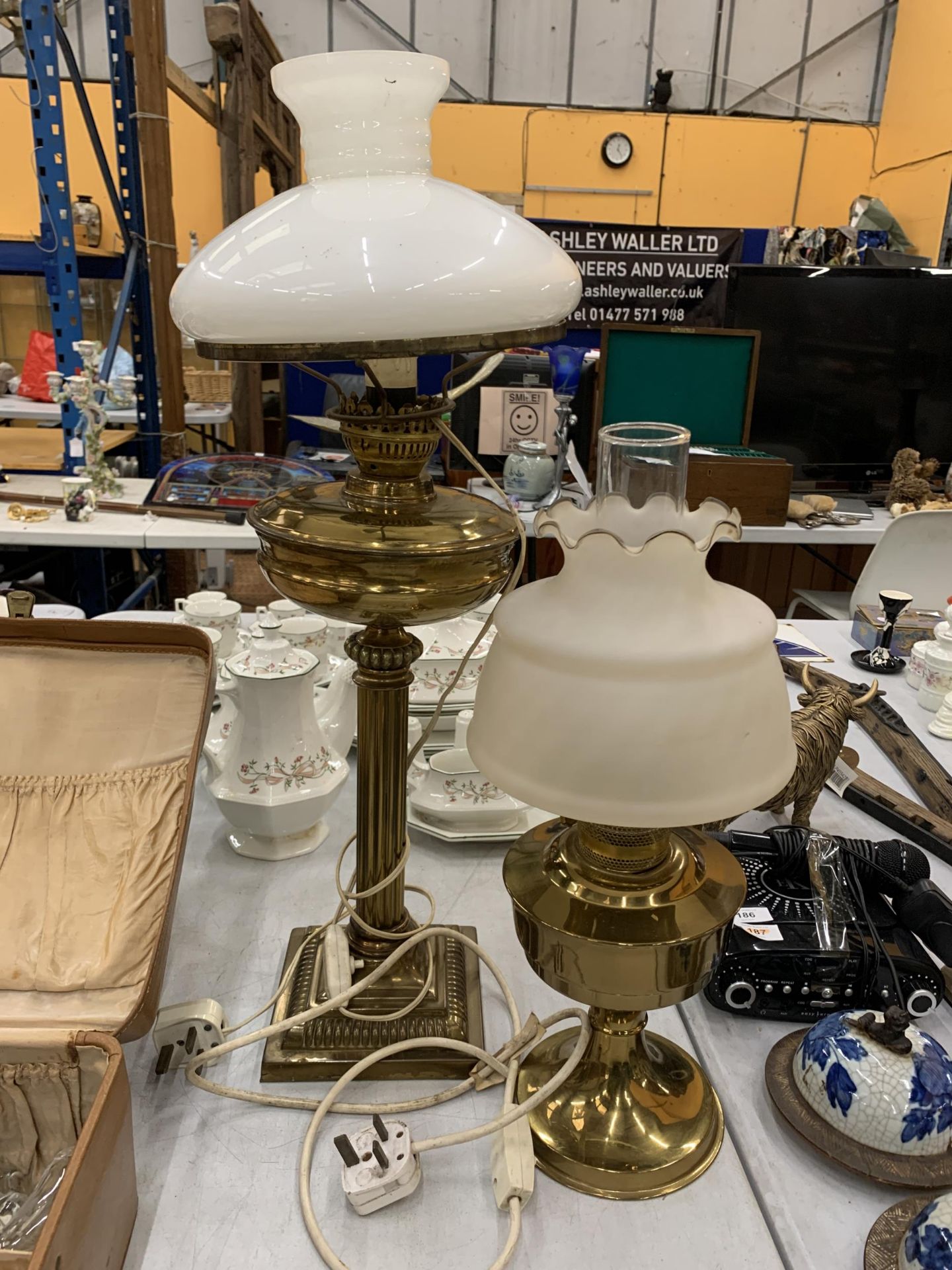 TWO VINTAGE BRASS OIL LAMPS CONVERTED TO ELECTRICITY