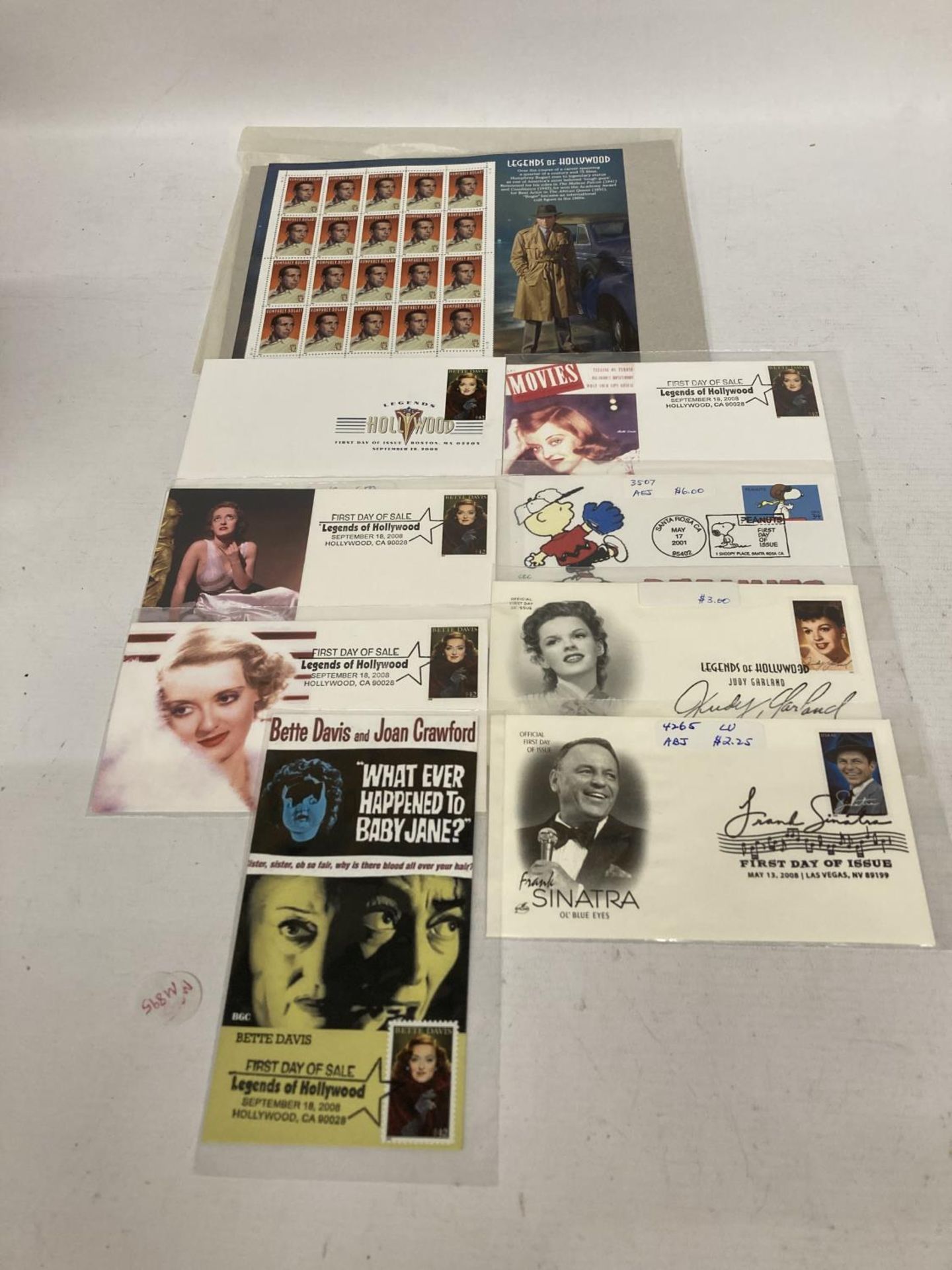 TEN WALLETS OF HOLLYWOOD LEGENDS FIRST DAY COVERS TO INCLUDE BETTY DAVIES, JUDY GARLAND, GRACE