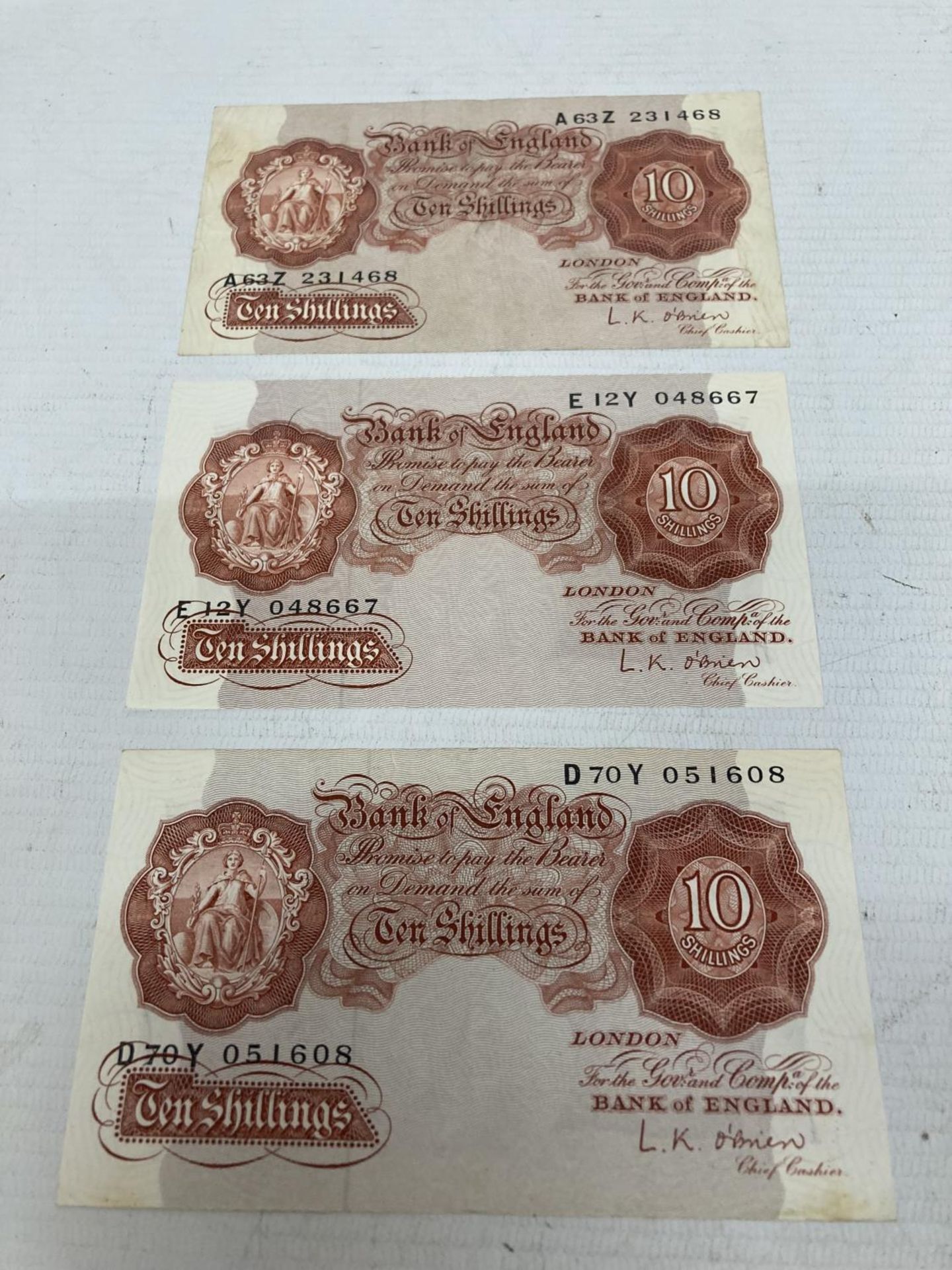 THREE BANK OF ENGLAND TEN SHILLINGS NOTES SIGNED PEPPIATT (1934-1949).