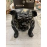 A BLACK BULLDOG FIGURE