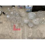 AN ASSORTMENT OF GLASS WARE TO INCLUDE DECANTORS AND BOWLS ETC