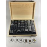 A COLLECTOR’S CASE HOUSING SILVER AND BRASS 3D PIECES , QV-QE11