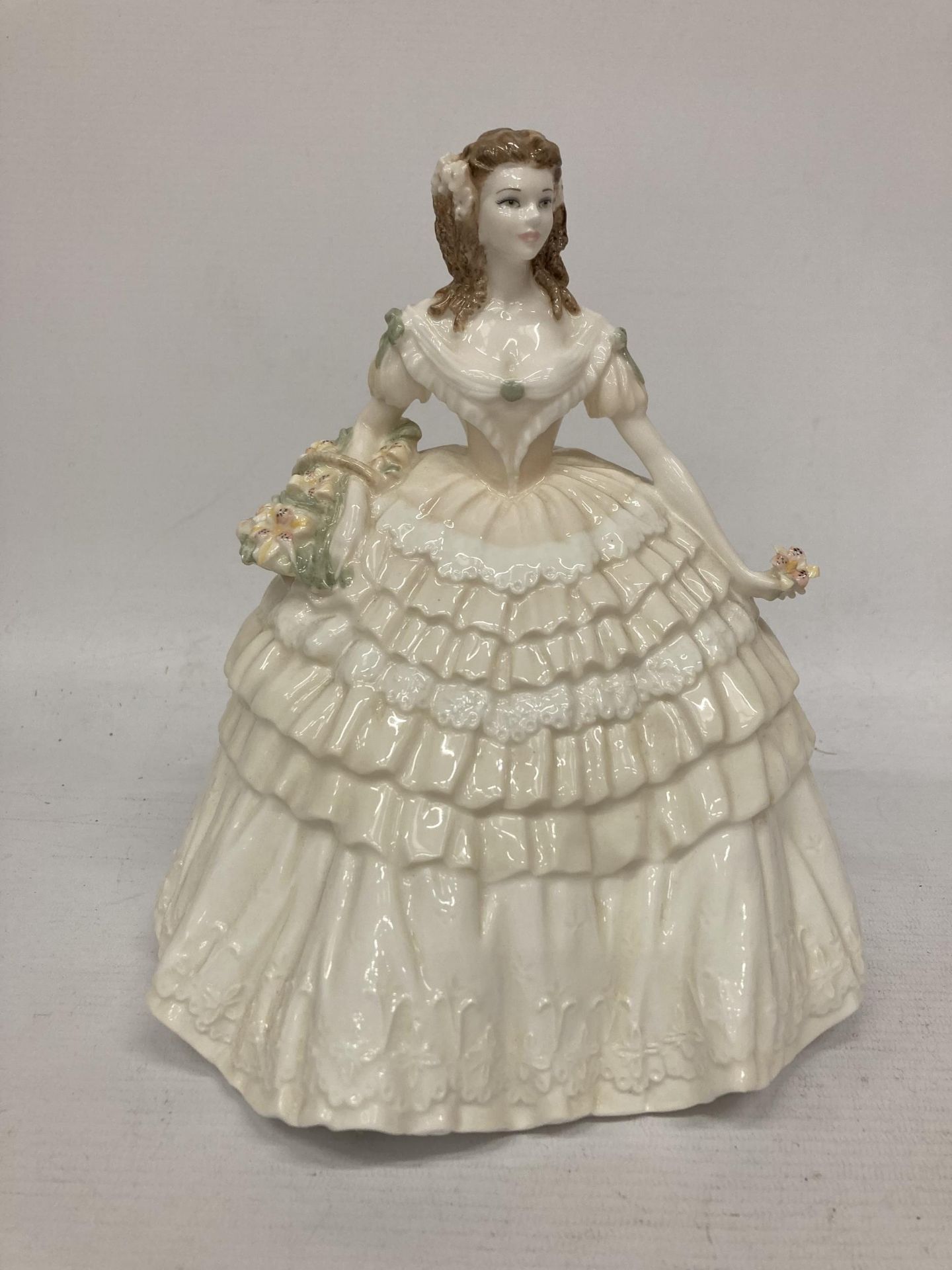 A STUNNING COALPORT FIGURINE FROM "THE FOUR FLOWERS COLLECTION" SCULPTED BY JACK GLYNN AND BEING A