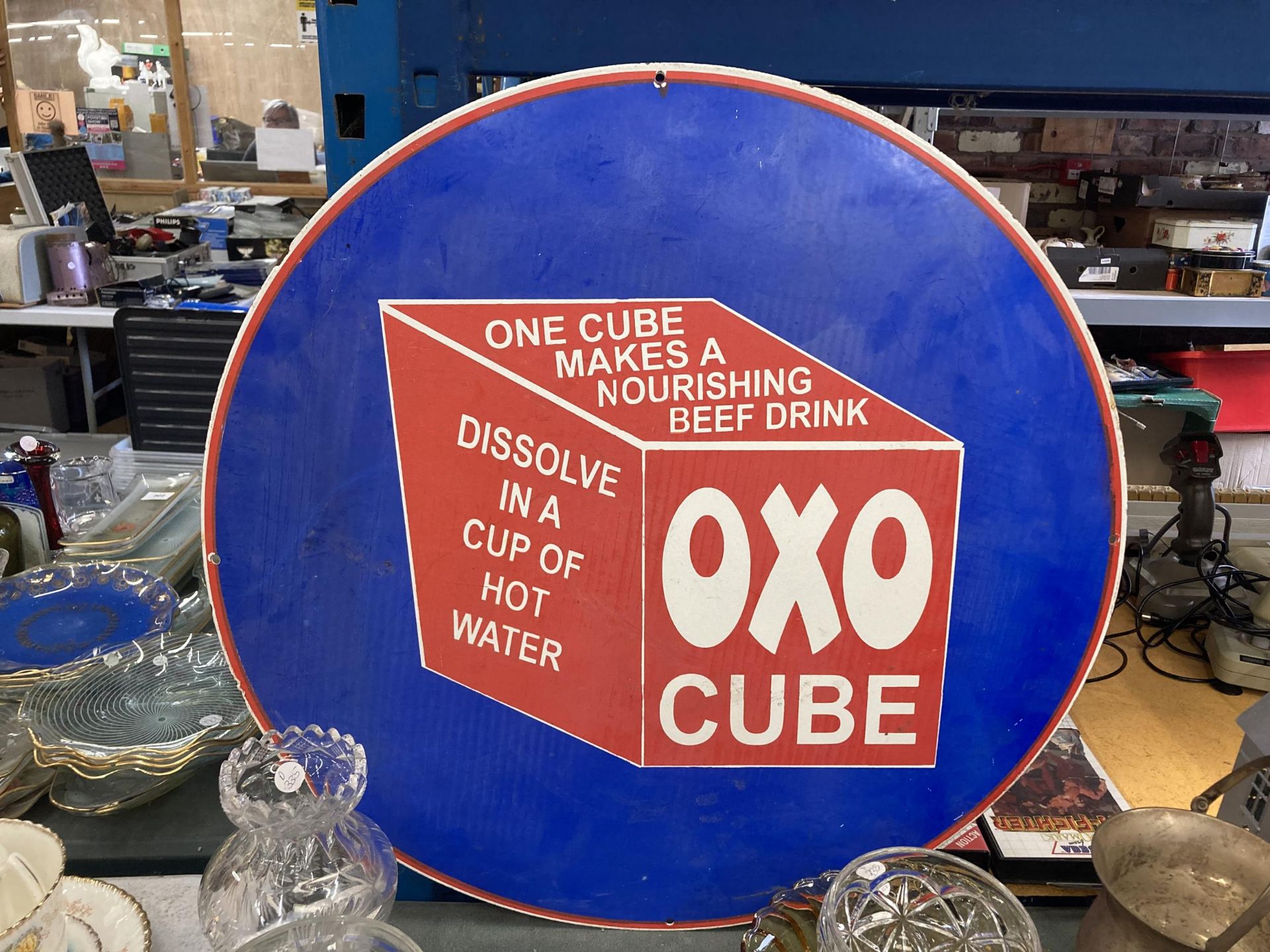 A LARGE METAL OXO CUBE CIRCULAR SIGN, DIAMETER 61CM