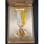 A GILDED BENEMERENTI MEDAL IN PRESENTATION BOX