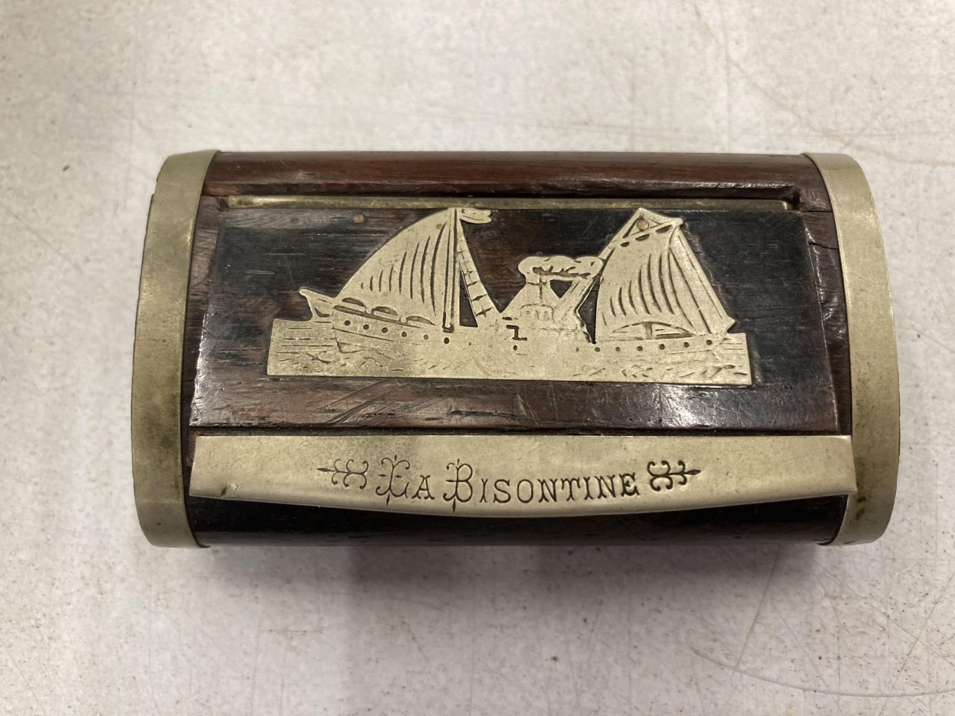 A VINTAGE BISONTINE WOODEN AND METAL BOUND SNUFF BOX