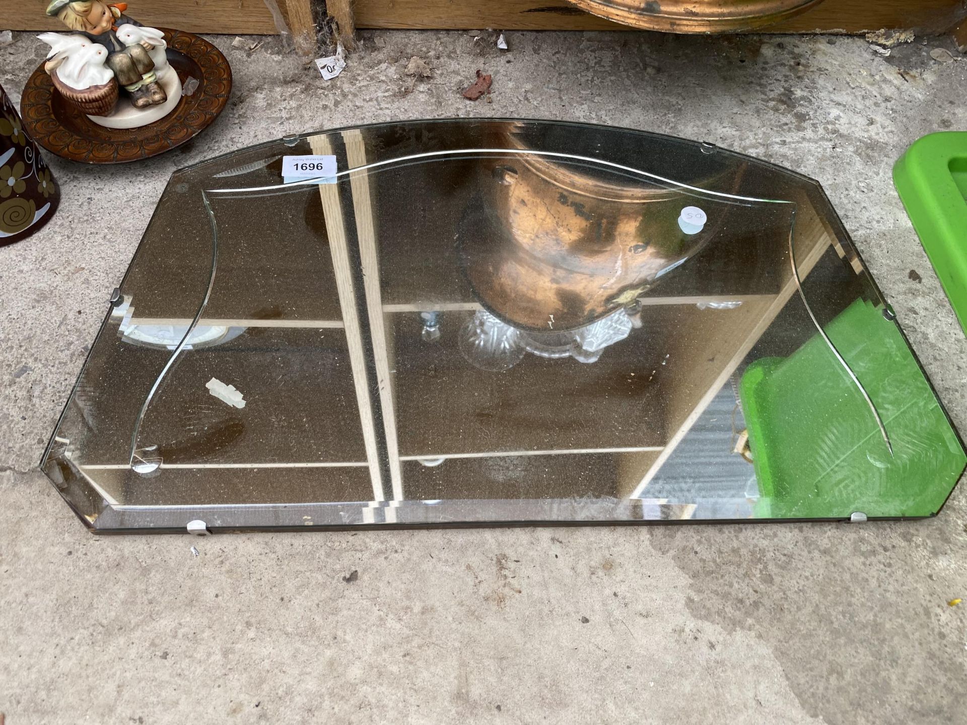 AN ART DECO BEVELED EDGE WALL MIRROR