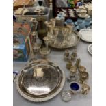 A LARGE QUANTITY OF SILVER PLATED ITEMS TO INCLUDE A FOOTED TRAY, CANDLEABRA, WINE GOBLETS,