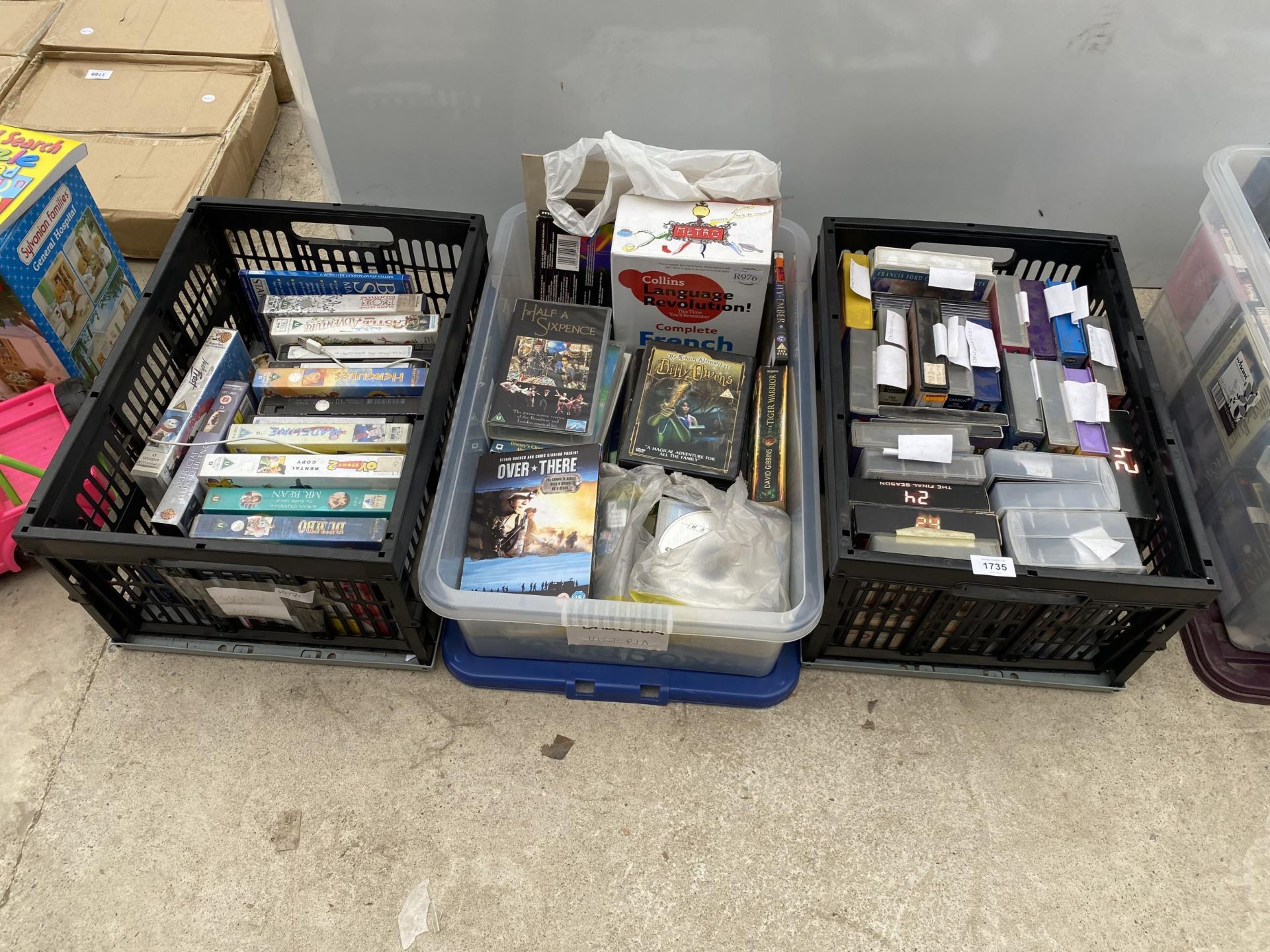 AN ASSORTMENT OF VHS VIDEOS AND DVDS