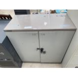 A RONEO VICKERS TWO DOOR METAL LOCKABLE CUPBOARD