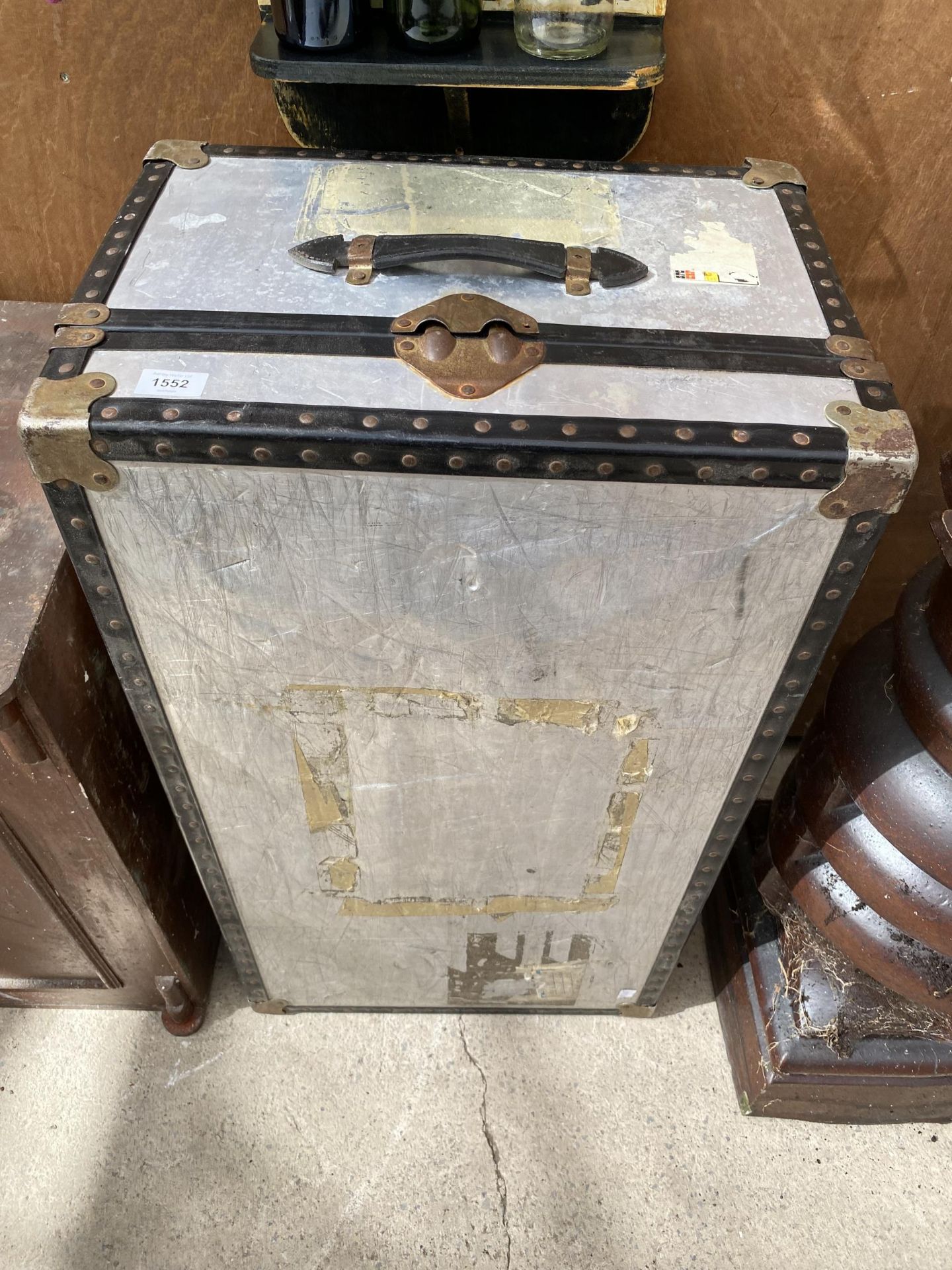 A HARD CASED TRAVEL TRUNK