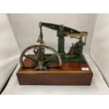 A VINTAGE STATIONARY STEAM ENGINE WHICH CAN RUN OFF COMPRESSED AIR OR STEAM