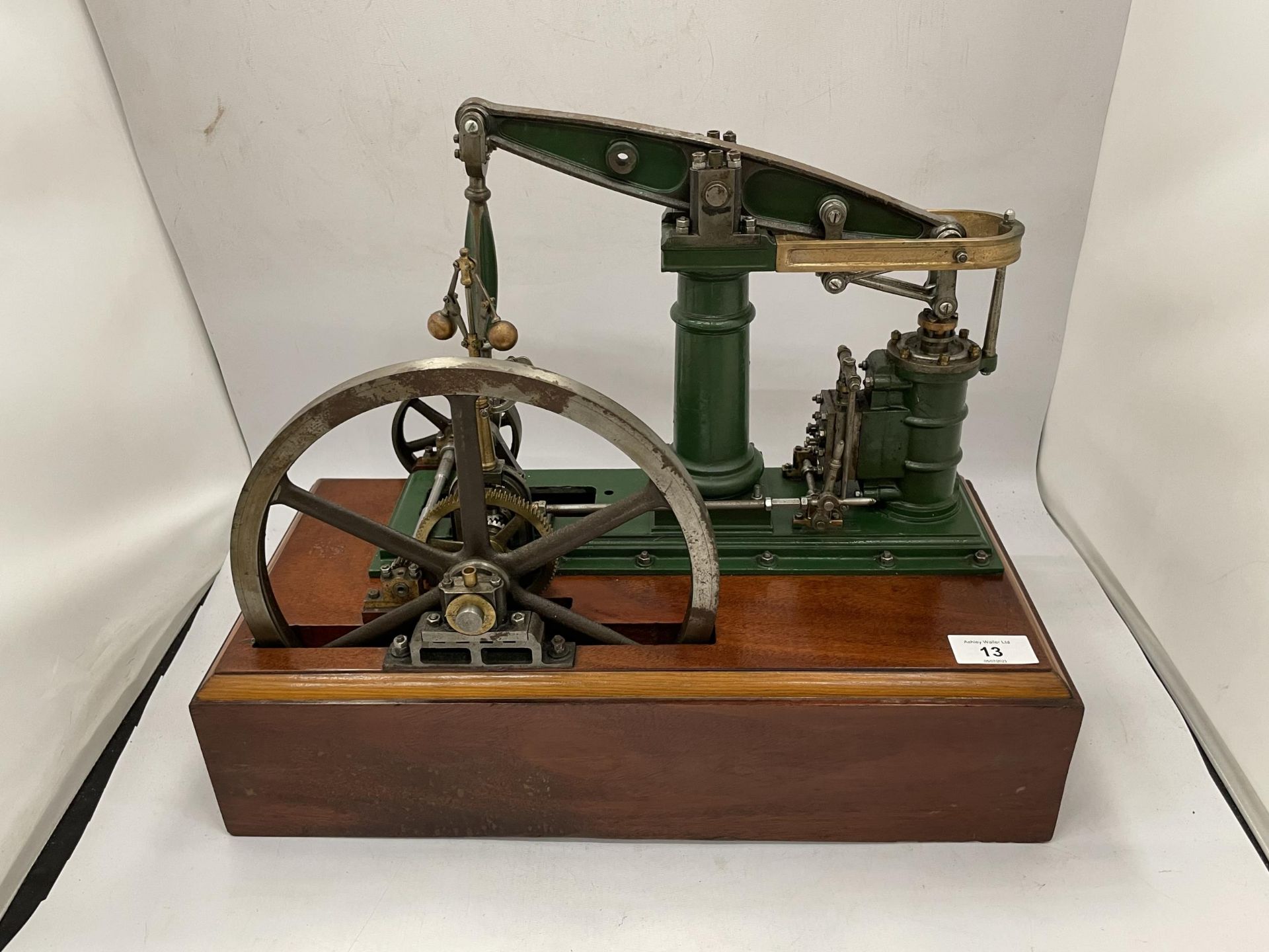 A VINTAGE STATIONARY STEAM ENGINE WHICH CAN RUN OFF COMPRESSED AIR OR STEAM