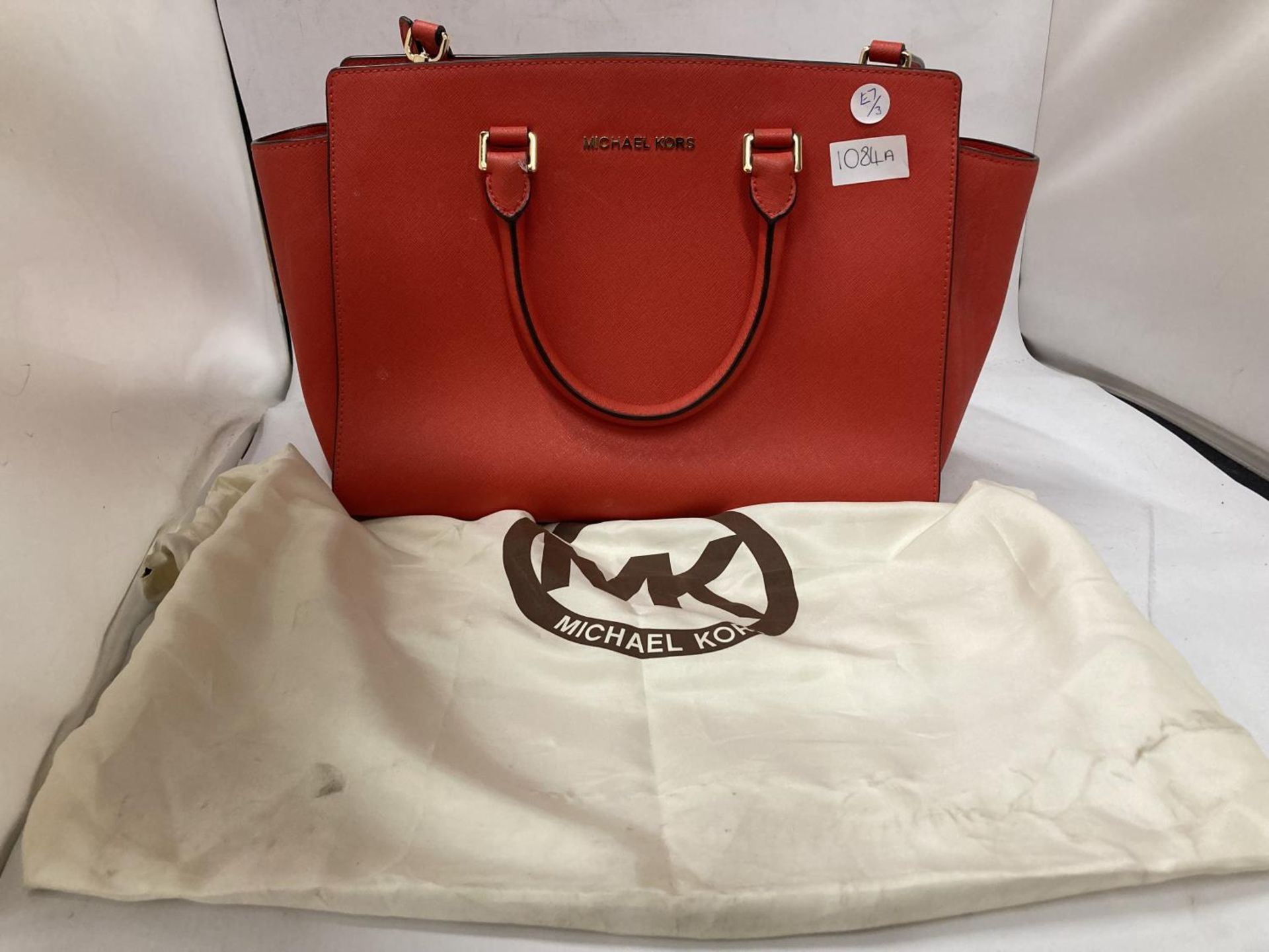 A MICHAEL KORS RED HANDBAG WITH DUST JACKET