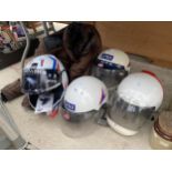 FOUR MOTORBIKE HELMETS AND A JACKET