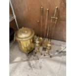 AN ASSORTMENT OF BRASS FIRE SIDE ITEMS TO INCLUDE A COAL BUCKET, FIRE DOGS AND COMPANION ITEMS ETC