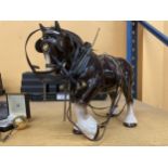 A VINTAGE CERAMIC SHIRE HORSE FIGURE WITH TACK ACCESSORIES