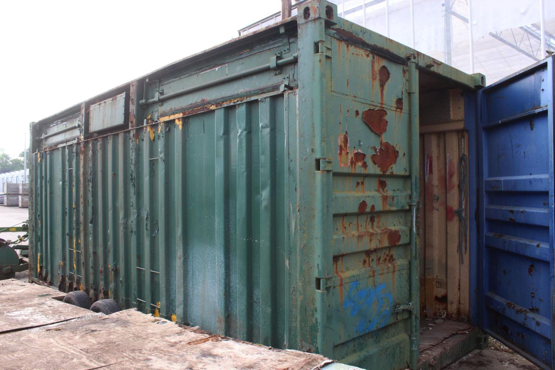 A GREEN METAL 20 FT CONTAINER + VAT