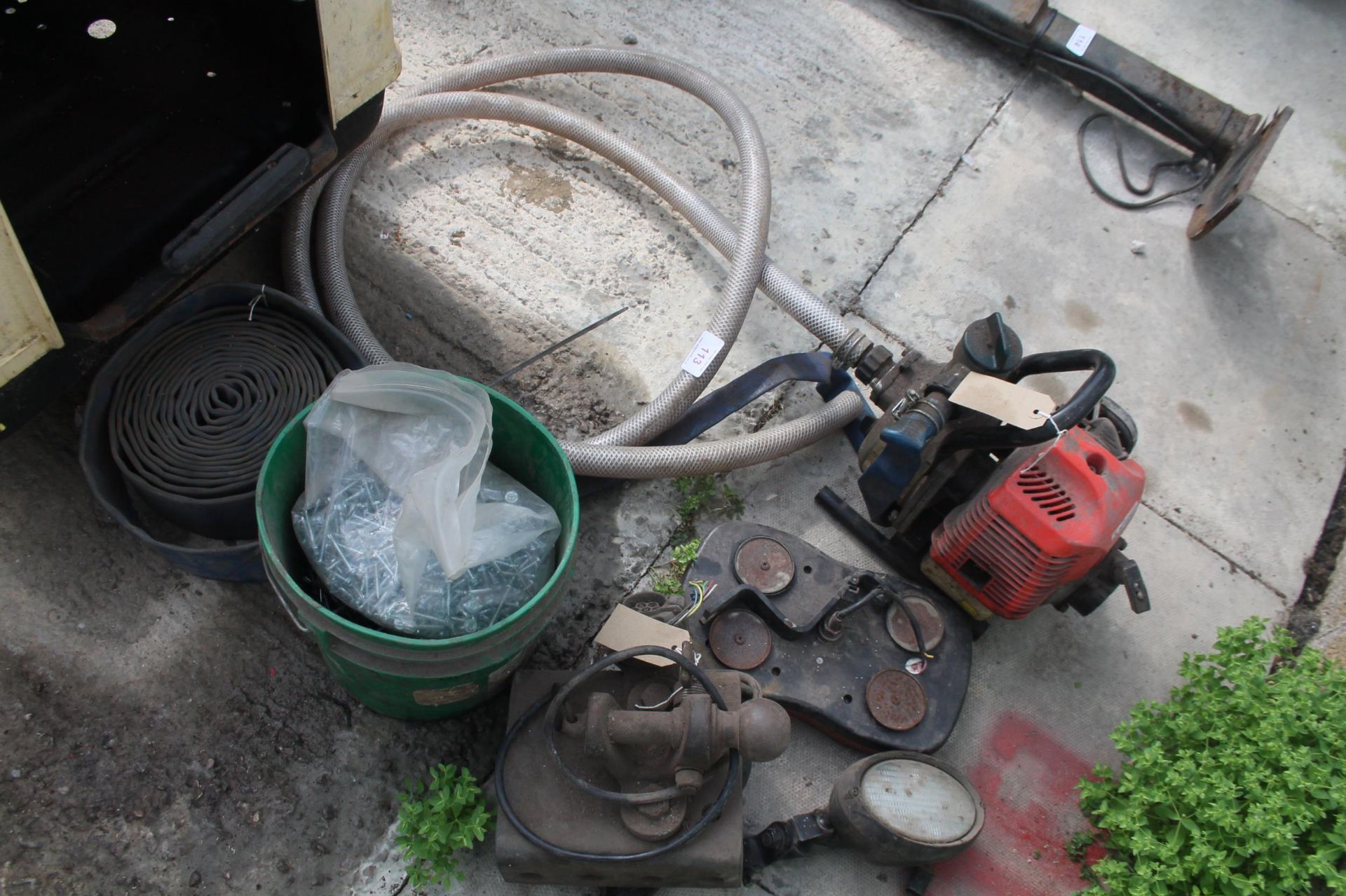 AN ASSORTMENT OF ITEMS TO INCLUDE A SUBMERSIBLE PUMP, A VEHICLE LIGHT AND A TOW BALL NO VAT
