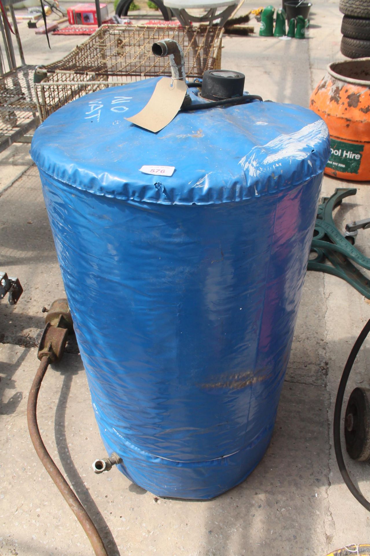 BLACK ROUND WATER TANK AND CONTENTS NO VAT