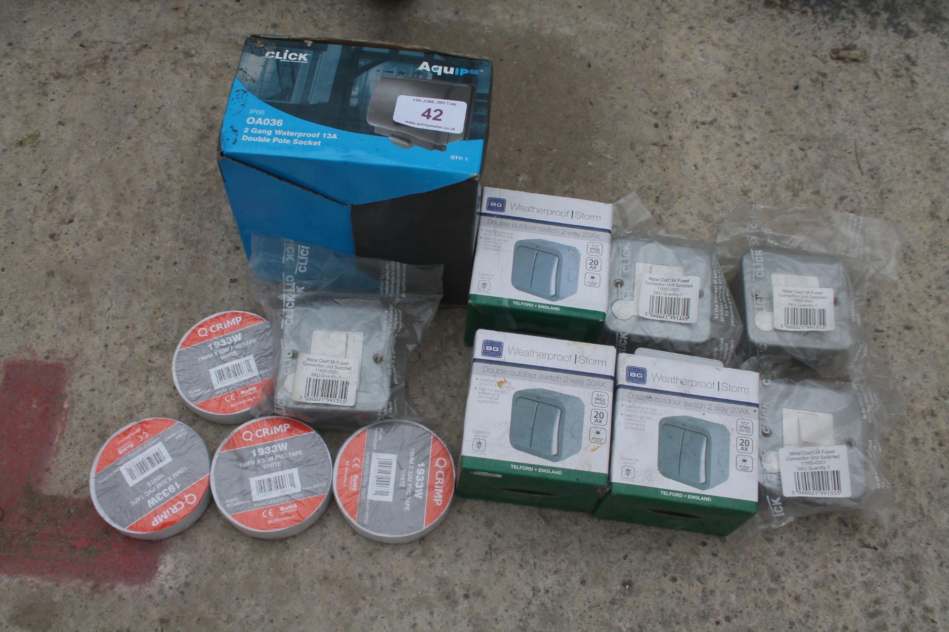 A COLLECTION OF NEW AND BOXED OUTDOOR LIGHTS AND SOCKETS AND ELECTRICAL TAPE - NO VAT