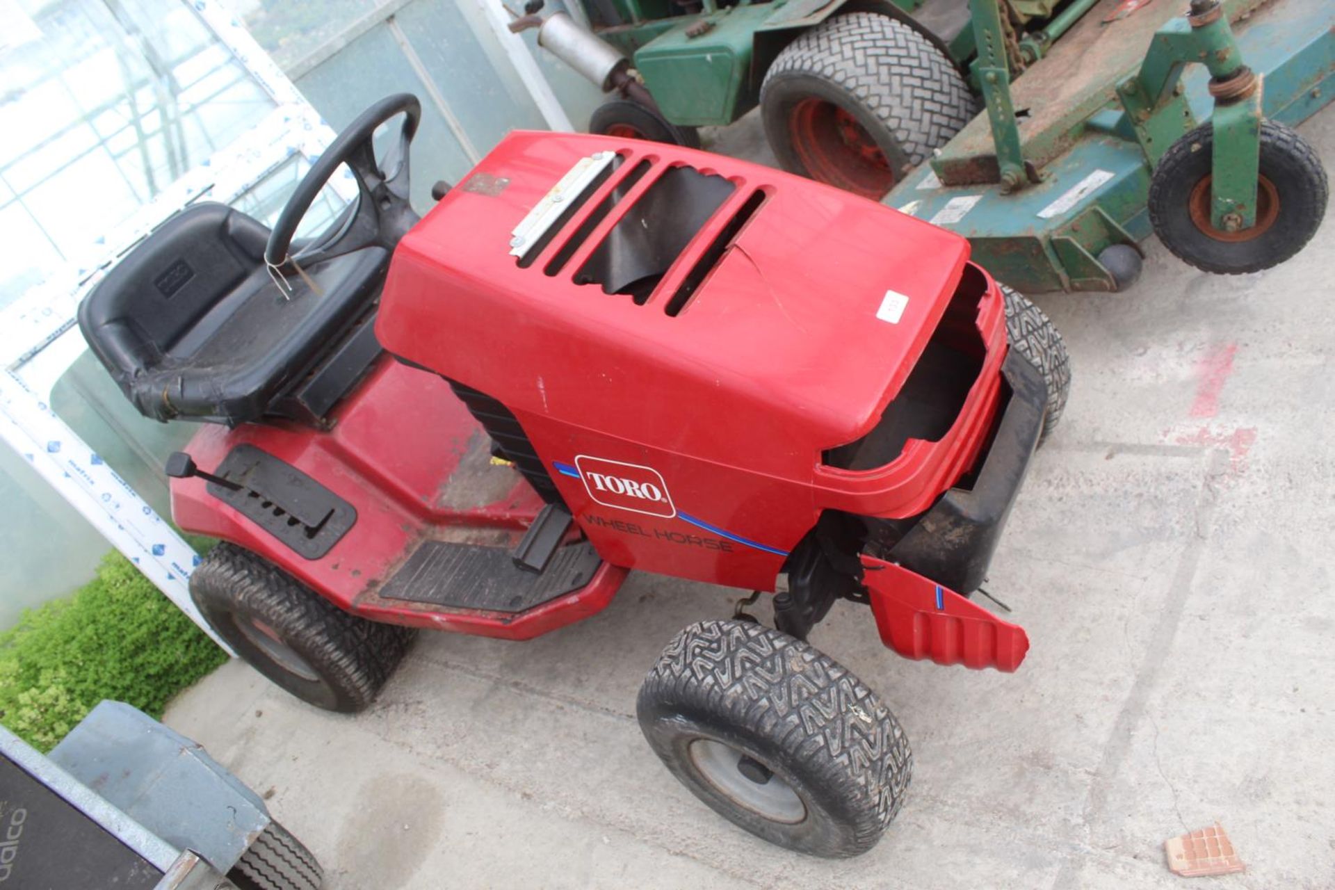 A TORO 13-38XL RIDE ON LAWNMOWER, LACKING CUTTING DECK AND GRASS BOX NO VAT